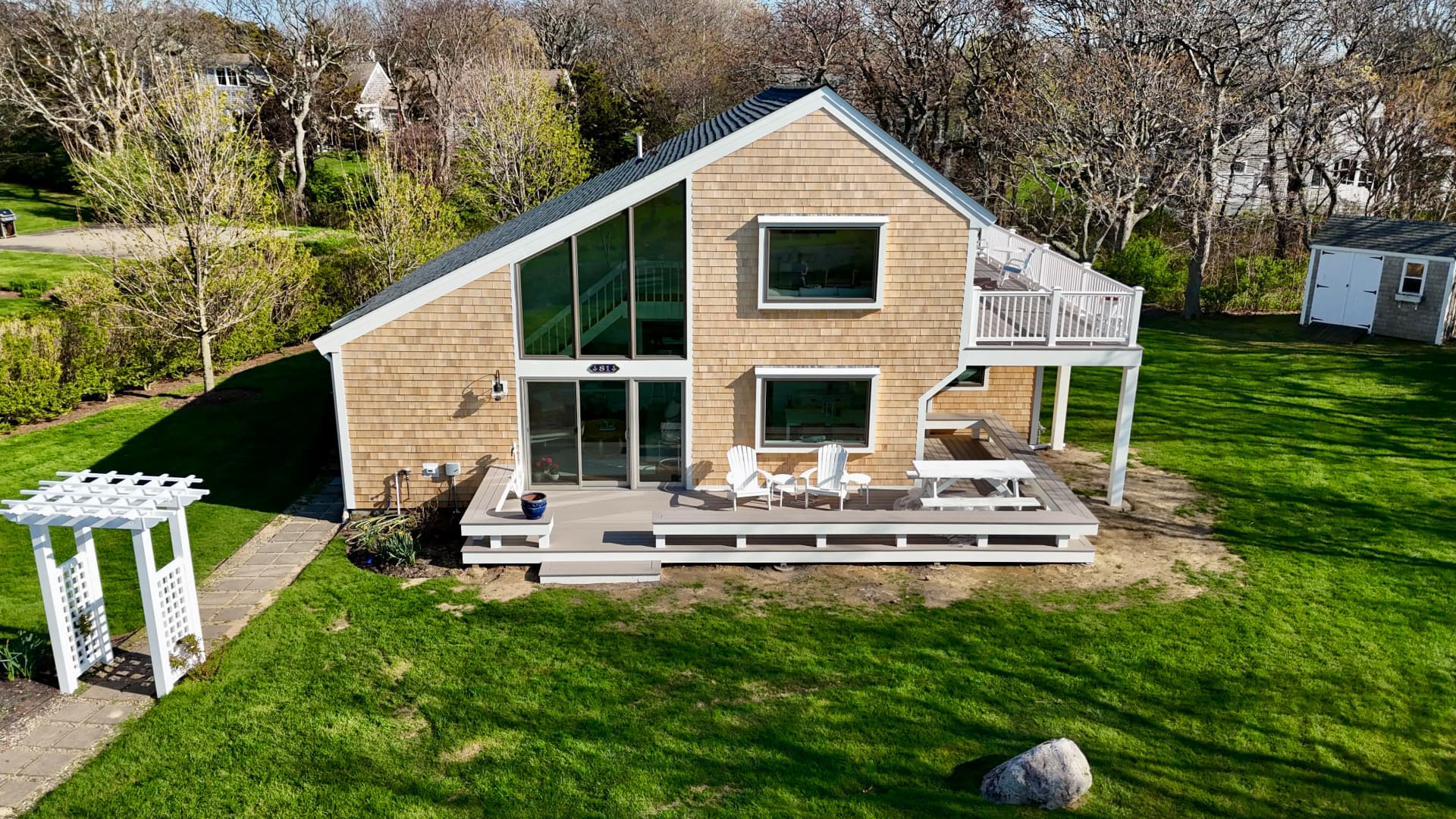 Cape Cod Home Gets a Full Exterior Upgrade with Cedar Shingles and Architectural Roofing image